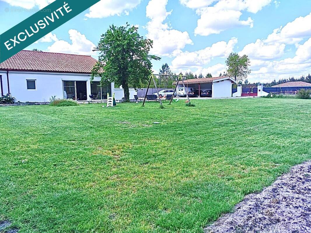 Photo 1 - Maison à SAUGNACQ-ET-MURET