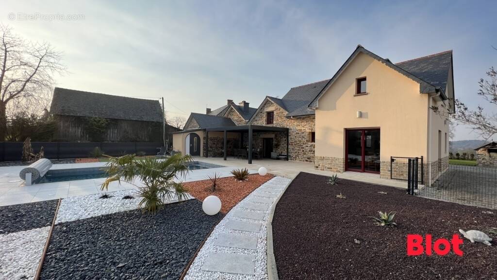 Maison à LA BOUEXIERE