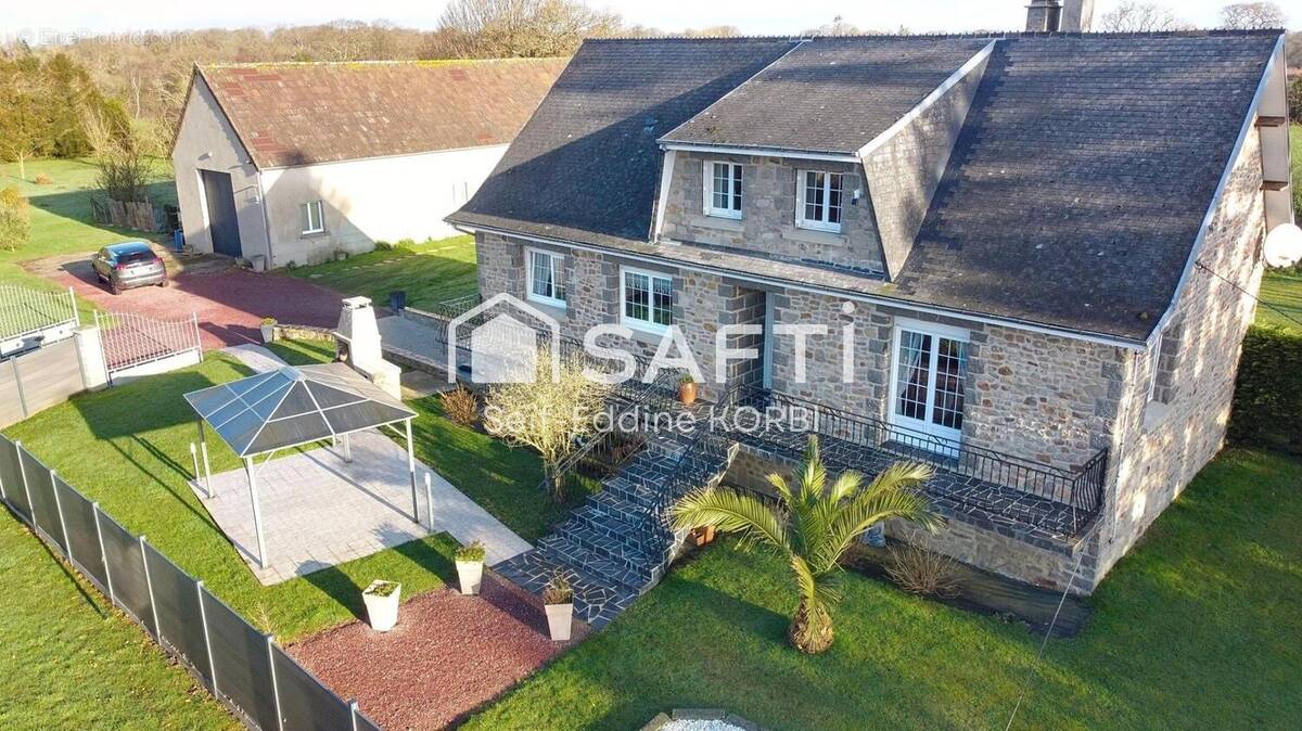 Photo 1 - Maison à BRICQUEBEC