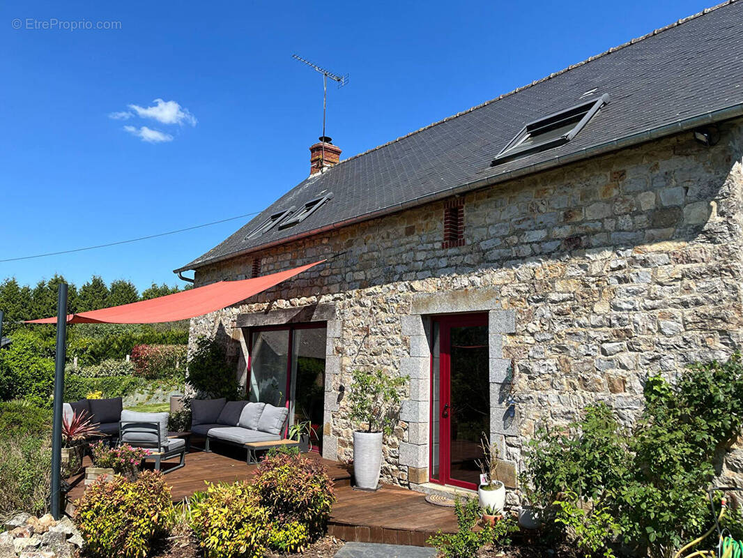 Maison à JUVIGNE