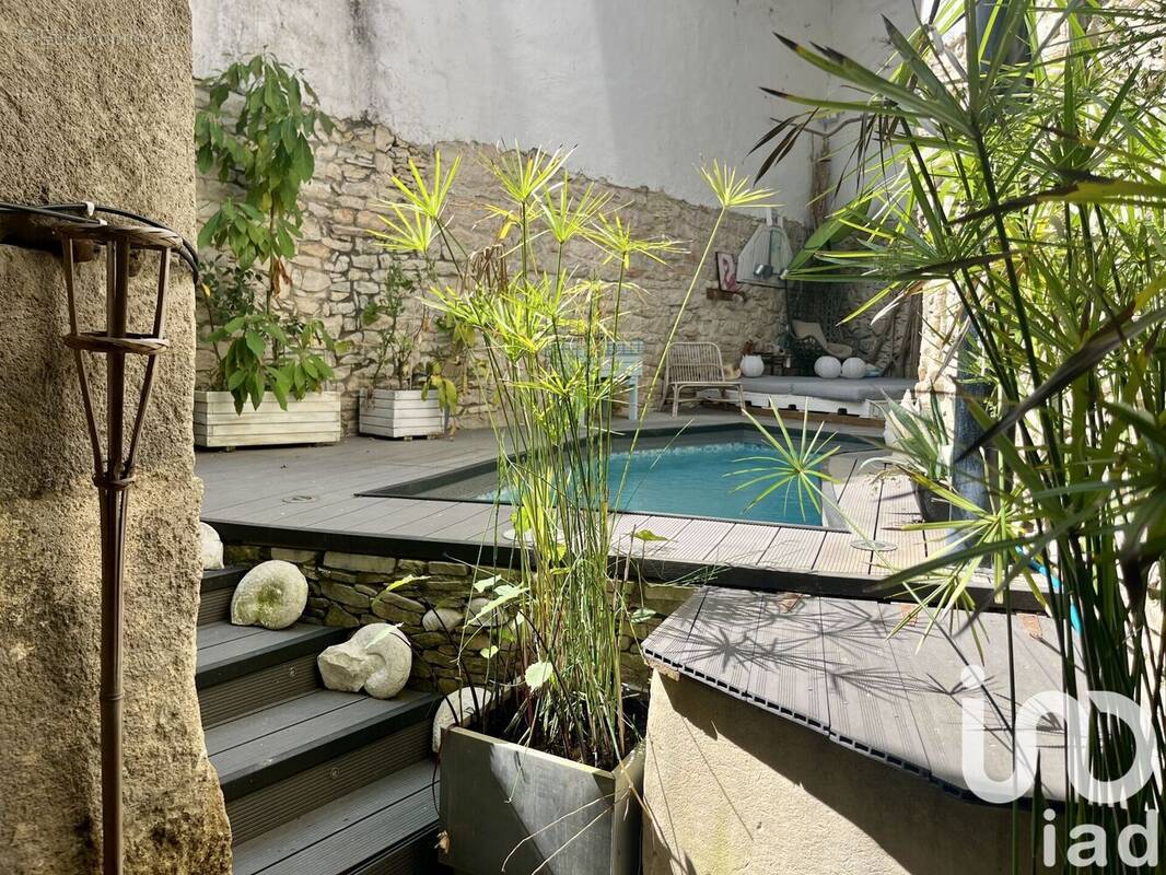 Photo 1 - Maison à CALVISSON