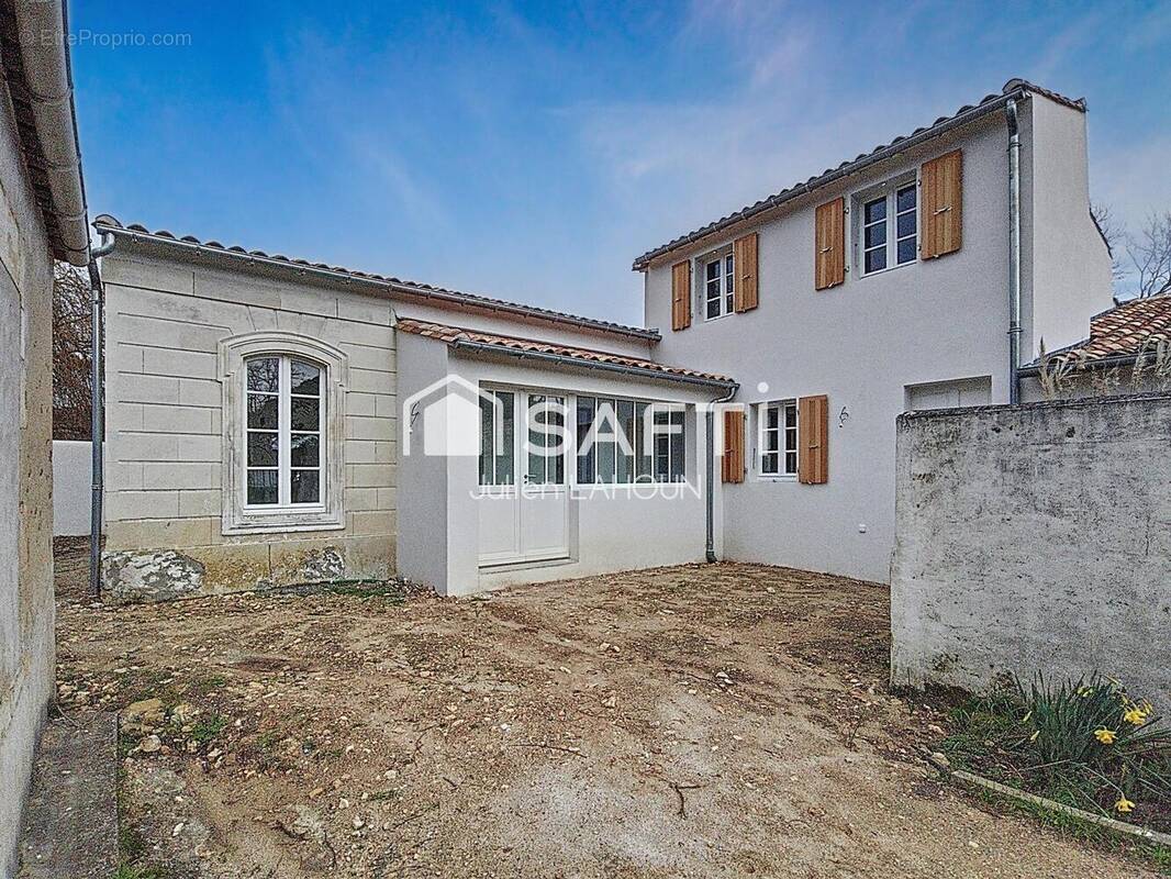 Photo 1 - Maison à LES PORTES-EN-RE