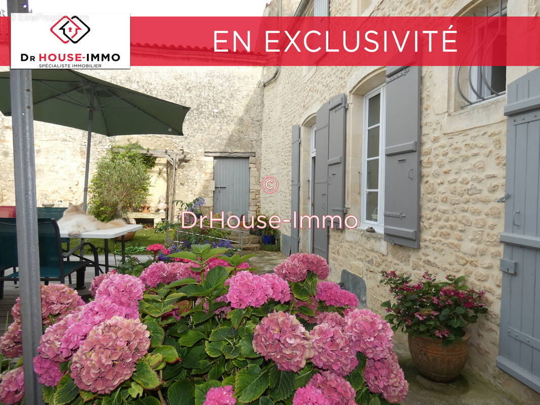 Maison à MARENNES