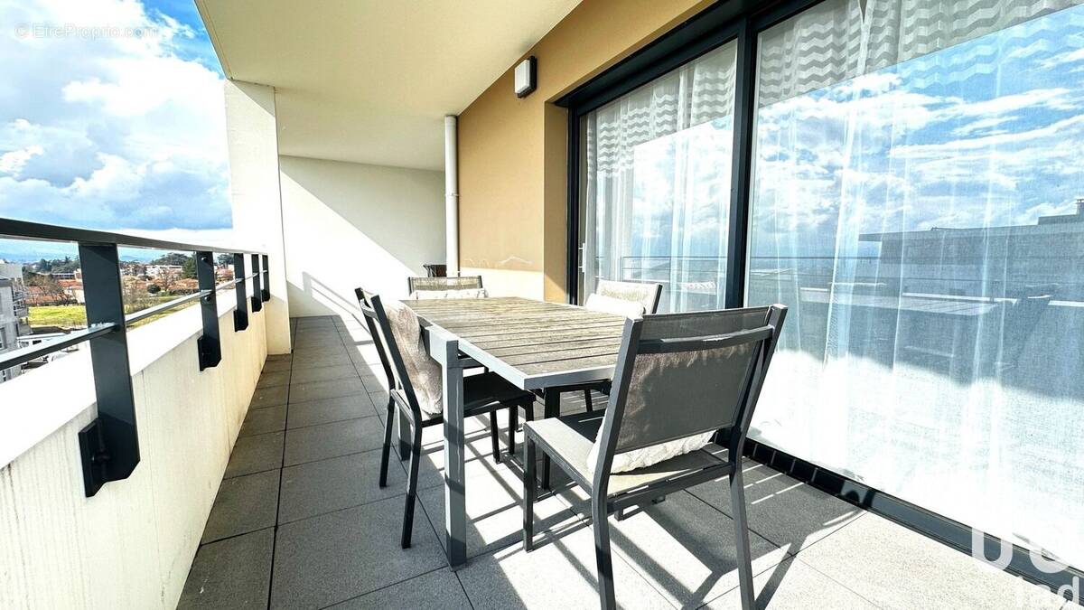 Photo 1 - Appartement à ANDREZIEUX-BOUTHEON