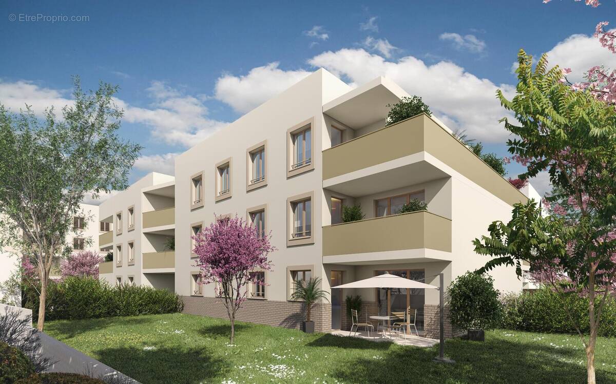Photo 1 - Appartement à ANDREZIEUX-BOUTHEON