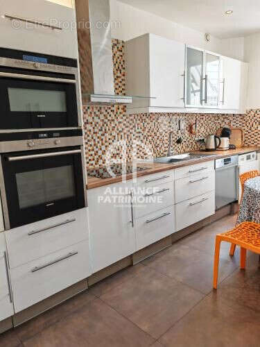 Cuisine équipée aménagée, - Appartement à PARIS-16E