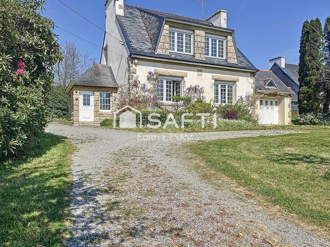 Photo 1 - Maison à PLUGUFFAN