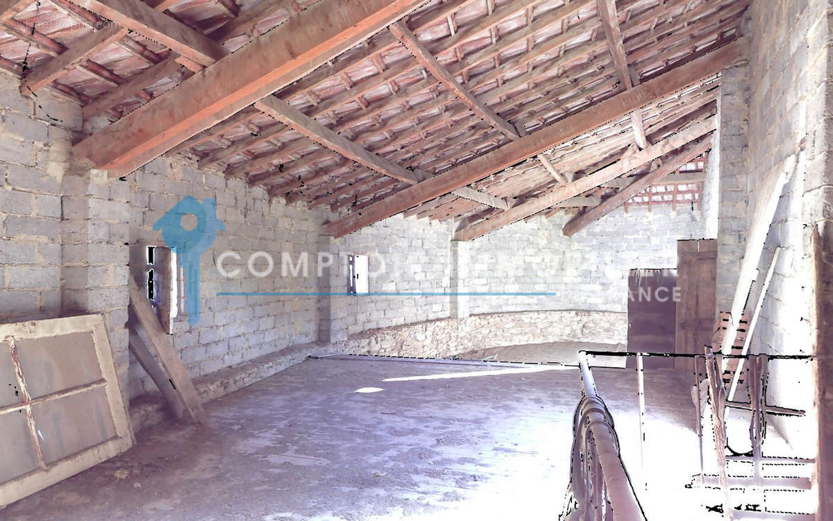 Maison à LAUDUN-L&#039;ARDOISE