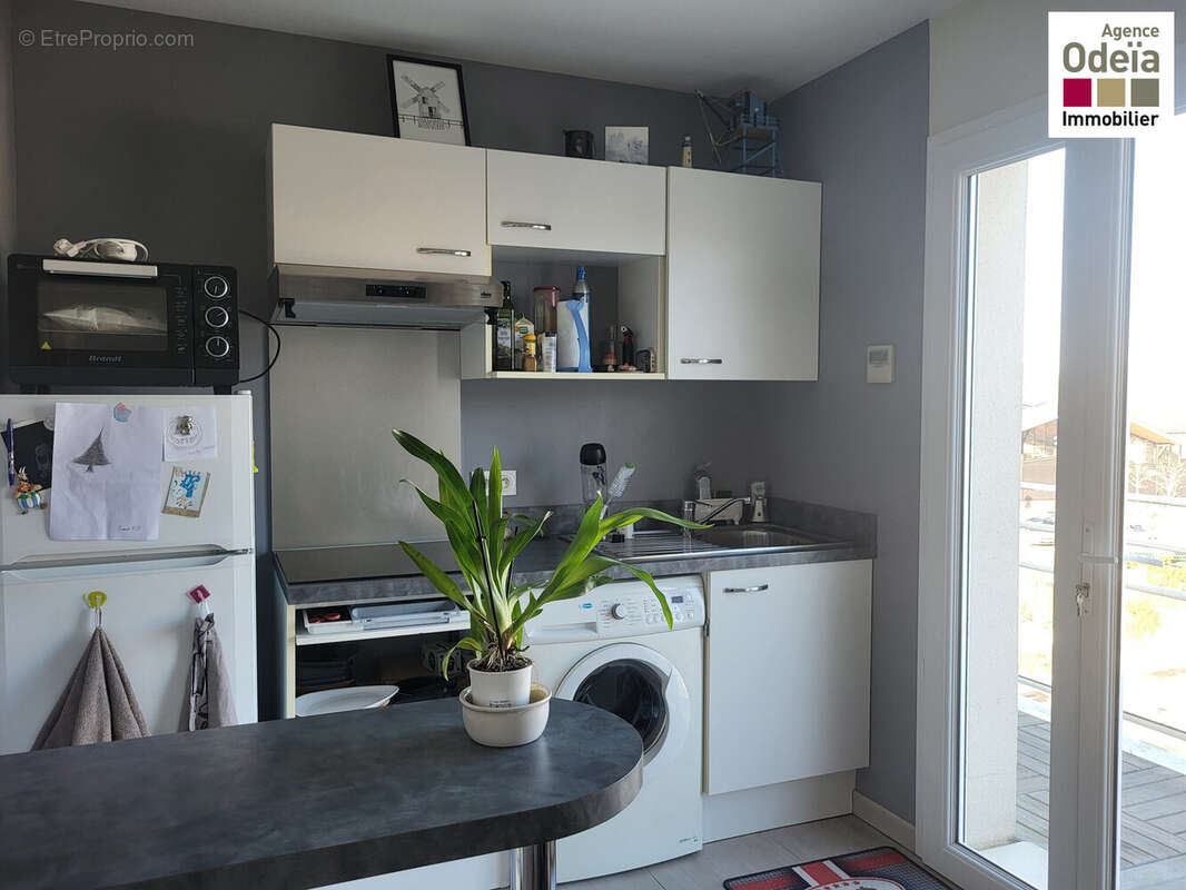 Andernos les Bains - Agence Odeïa Immobilier - cuisine - Appartement à ANDERNOS-LES-BAINS