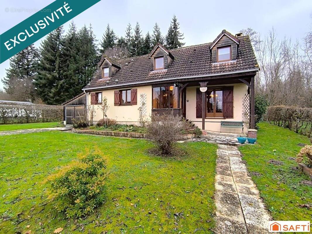 Photo 1 - Maison à LA MADELEINE-BOUVET