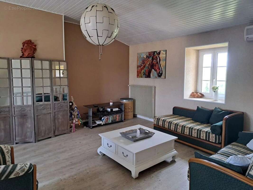 Maison à LANGON