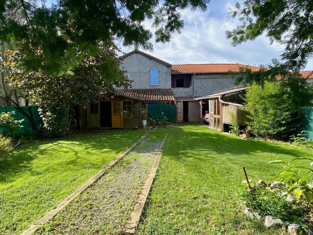 Photo 1 - Maison à GOURDAN-POLIGNAN