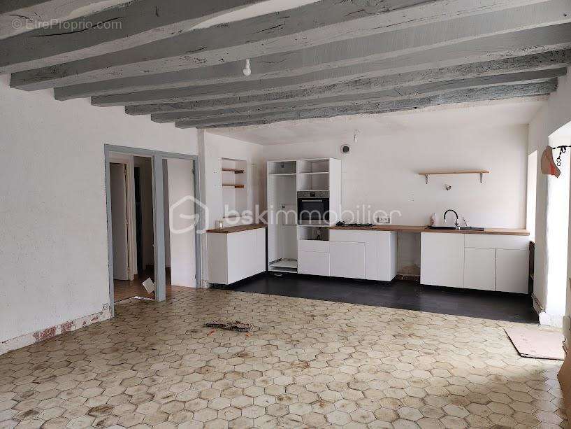 Maison à COMBOURTILLE
