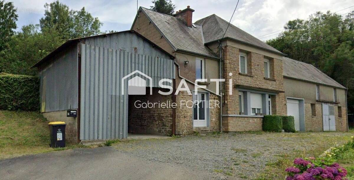 Photo 1 - Maison à VILLEDIEU-LES-POELES