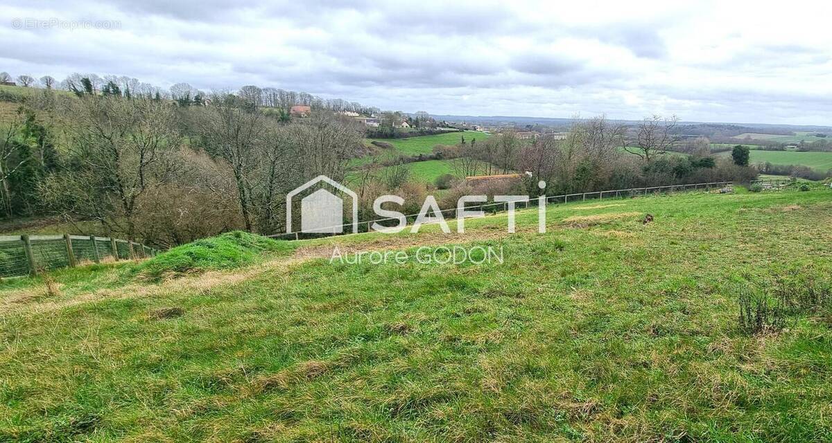 Photo 1 - Terrain à SAINT-LANGIS-LES-MORTAGNE