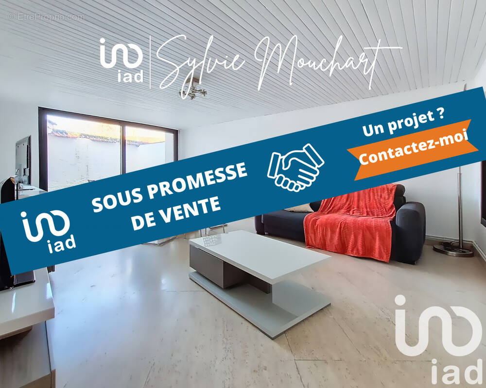 Photo 1 - Appartement à LE MESNIL-SAINT-DENIS