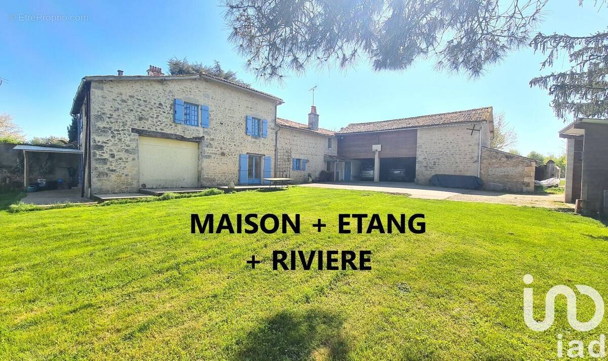 Photo 1 - Maison à VOUILLE