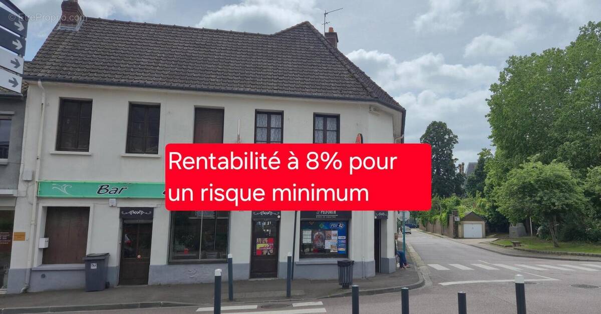 Photo 1 - Commerce à OISSEL