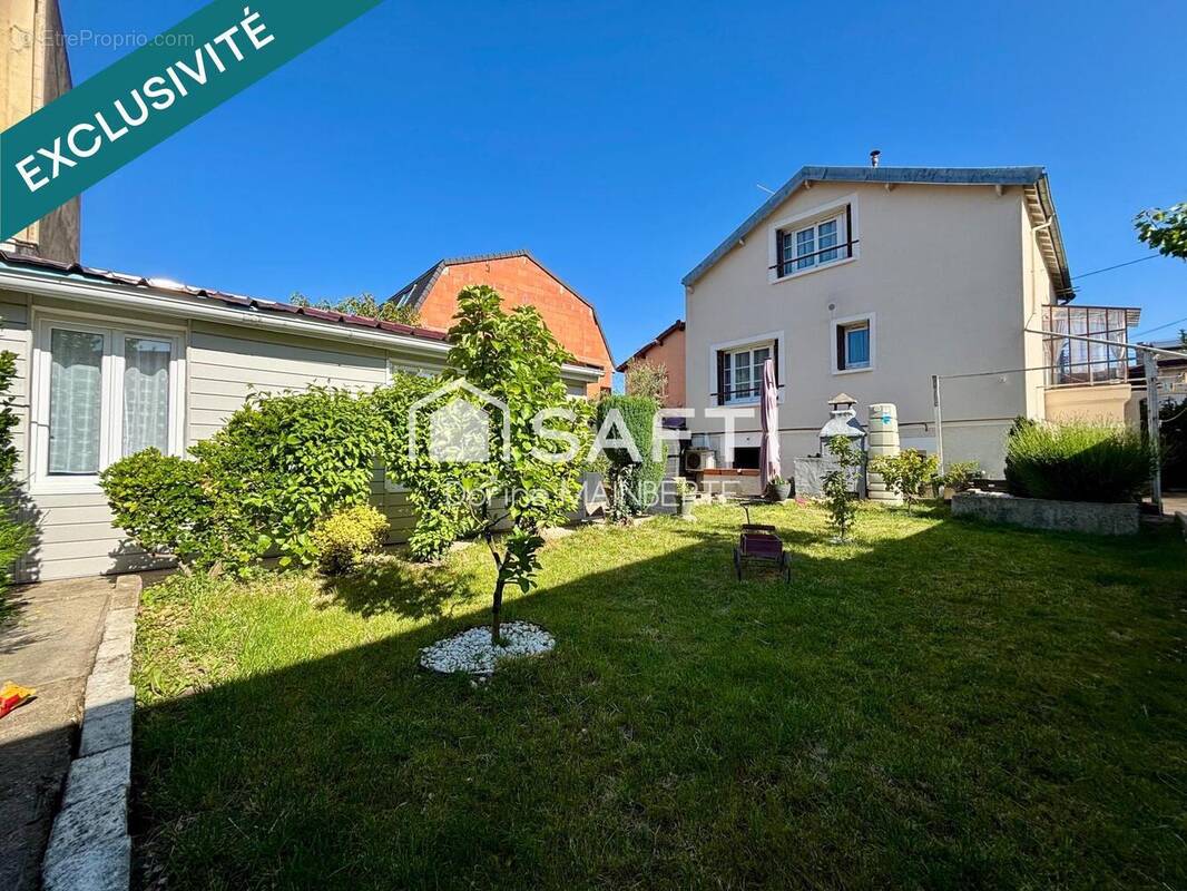 Photo 1 - Maison à STAINS