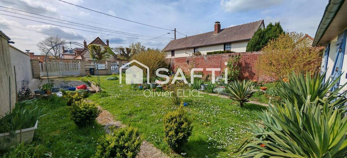 Photo 1 - Maison à BRETEUIL