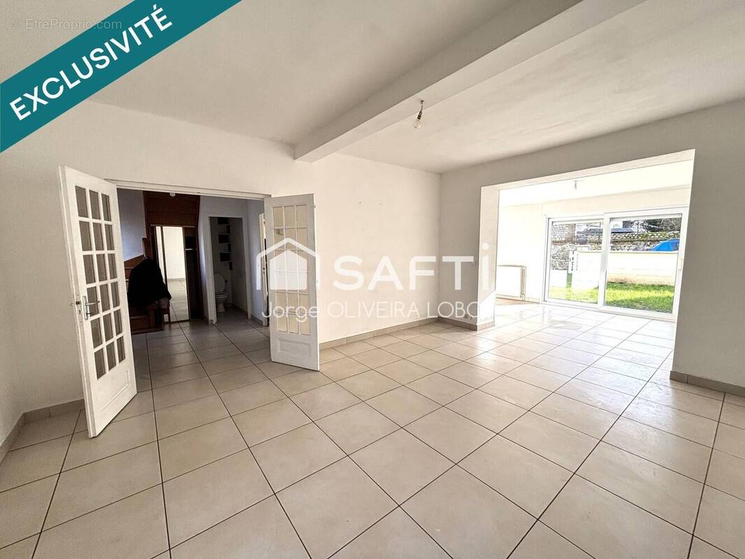 Photo 1 - Maison à SAINT-ETIENNE-DU-ROUVRAY