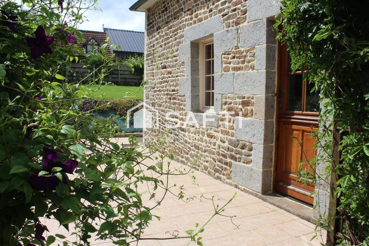 Photo 2 - Maison à ISIGNY-LE-BUAT