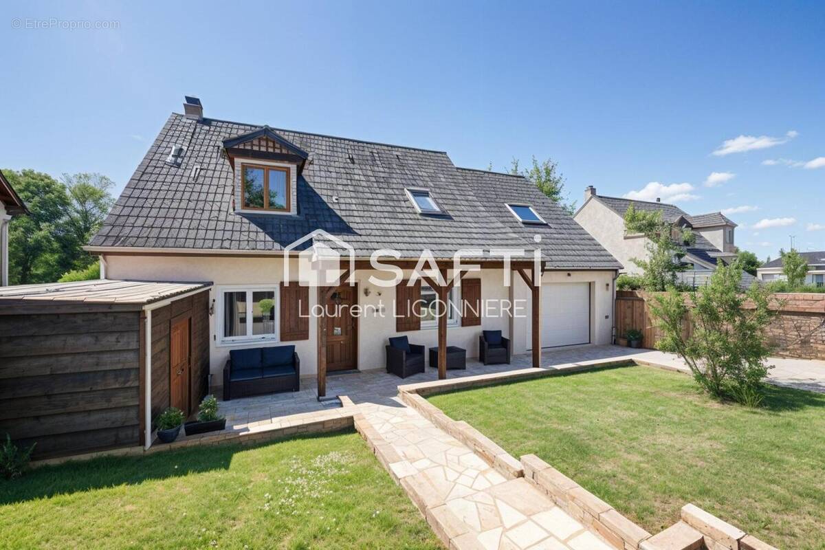 Photo 1 - Maison à BRIE-COMTE-ROBERT